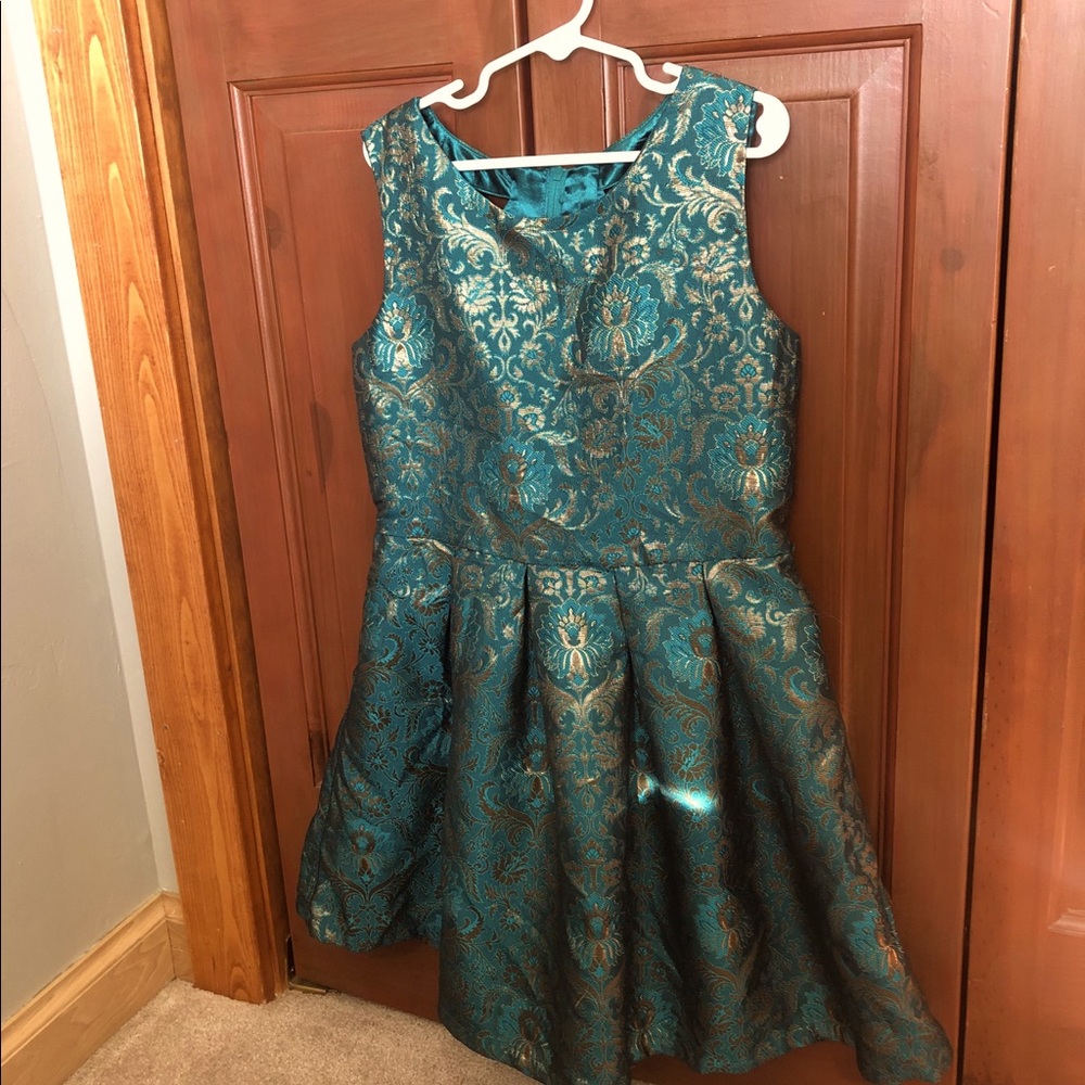 Girls emerald green and gold dress.